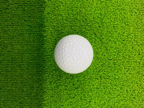 golf ball on green grass