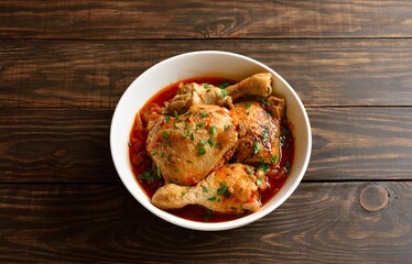 Georgian chicken stew with tomatoes and herbs