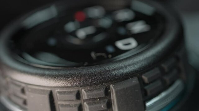 Driver's hand shifts the car gearbox drive mode to parking. Automatic electronic transmission and gear shift, P Park to D Drive and back in modern cars.