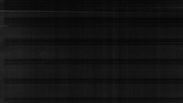 Abstract monochromatic animation of grunge textured photocopy papers. Black background. 4K Seamless loop. Slideshow. Low frame rate effect.