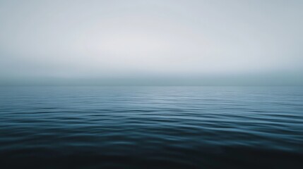 Obraz premium Foggy sky over the blue ocean water. 