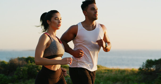 Running, beach and couple with fitness, training and cardio with journey, wellness and sports. People, marathon and man with woman, challenge or exercise with race, endurance and workout with support