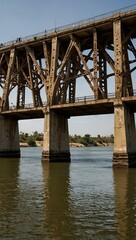 Fototapeta premium Railway bridge spanning a river in Saint Louis, Senegal.