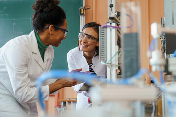 Diverse Female Engineers Engage in Robotics Project