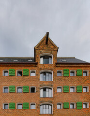 Naklejka premium View of an old single tenement house, which is arranged very symmetrically