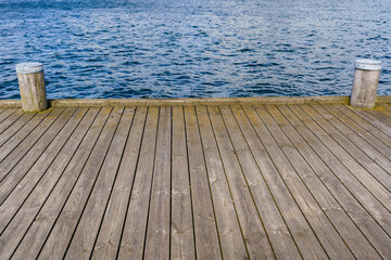 Wooden port with mooring places for boats and ships