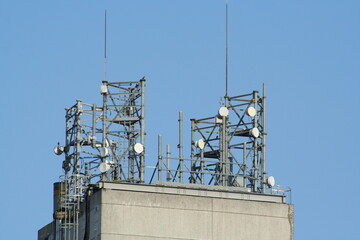Mobile phone towers on a rooftop