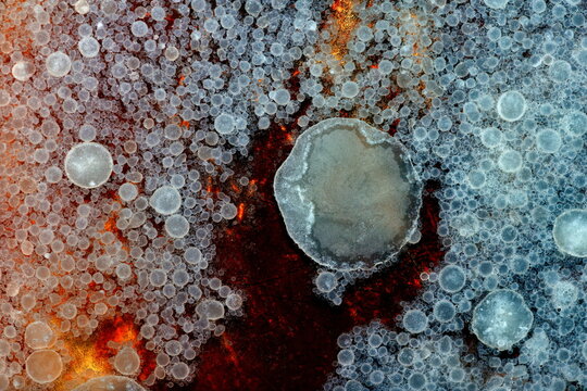 Inside the liquid texture of oil.