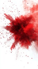 Vibrant red powder explosion creating an artistic burst of color against a white background.