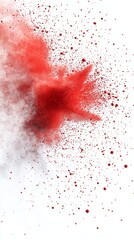 An explosion of vibrant red powder disperses against a clean white background, creating a dynamic visual effect.