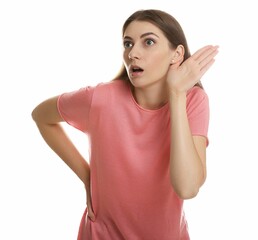 Woman showing hand to ear gesture on white background