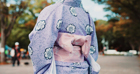 Culture, woman and kimono fashion in city for heritage, traditional style and floral pattern...