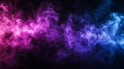 Fototapeta premium Colorful pink, blue and purple smoke on a black isolated background. Background from the smoke of vape