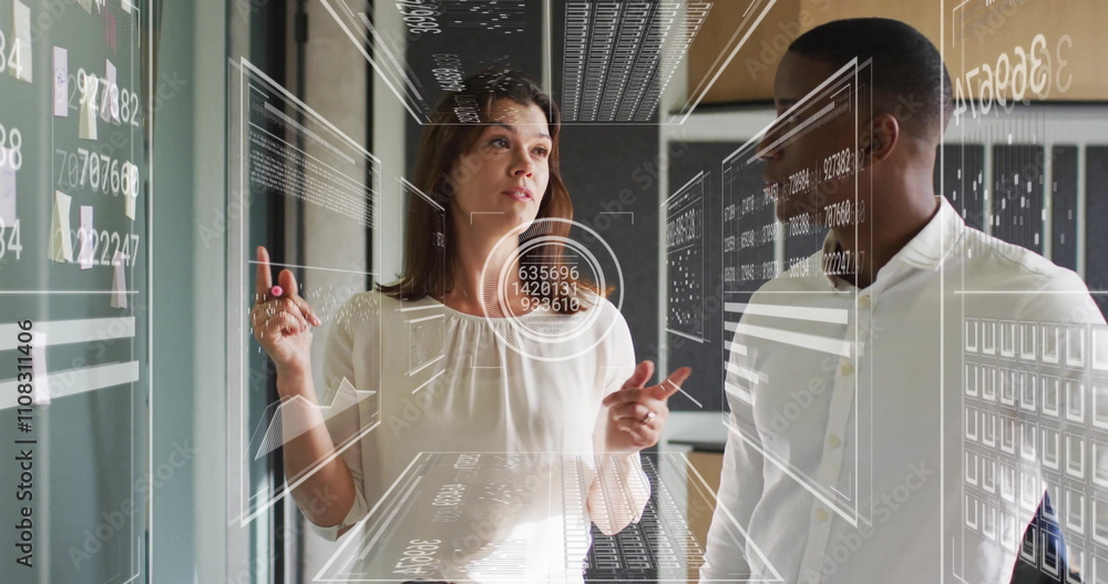 Aufkleber analyzing data on screen, business professionals with futuristic interface image