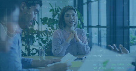 Image of financial data processing over diverse business people in office