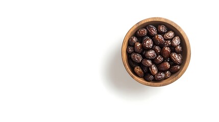 Fototapeta premium A Wooden Bowl Filled with Sweet Medjool Dates, a Delicious and Healthy Snack