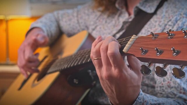 Cozy guitar vibes
Feel the warmth and tranquility of this evening scene. A man with curly hair fills his home with music, creating a beautiful and relaxing atmosphere. 
09.11.2024