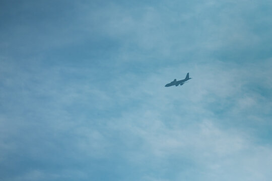 Silhouette of an Air Force refueling tanker in hazy skies
