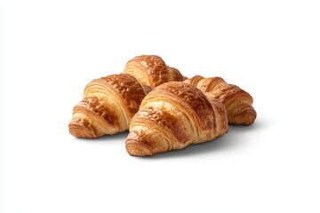 Golden croissants on a white surface