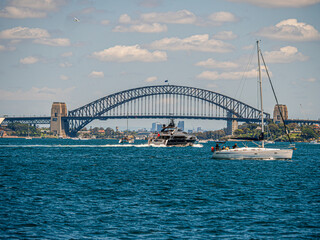Fototapeta premium Boats Cruising Below Seaplane Coming In Above