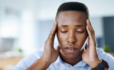 Strain, headache and black man in office, sick and thinking of debt, burnout and overworked with...
