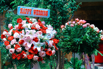 A bouquet of flowers displayed as a congratulatory wedding