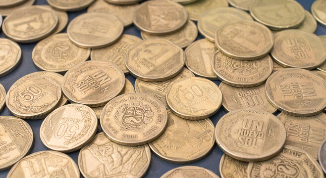 Various coins of sol and fifty centimos, Peruvian sol, coins, banknotes, currency, exchange rate, price increases. Various coins of sol and fifty centimos, peruvian sol, coins, banknotes, exchange cur