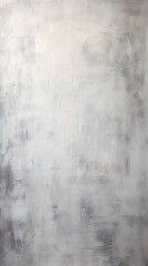 Obraz premium A textured gray wall with subtle variations in tone and depth, suggesting a minimalist aesthetic.