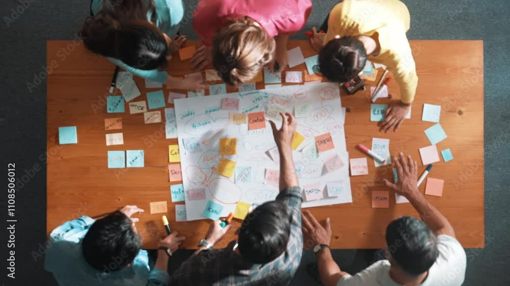 Poster top view of project manager writing and sticking stick notes. aerial view of professional business p