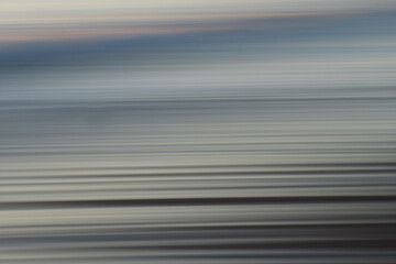 Sea surface abstract in soft grey and blue tones
