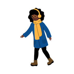 Cheerful girl in winter attire enjoying a walk during a sunny day