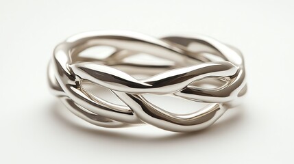 Fototapeta premium Elegant silver ring with intertwined design for a modern touch.