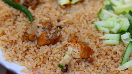 Delicious Plate of Fried Rice with Omelette and Fresh Vegetables