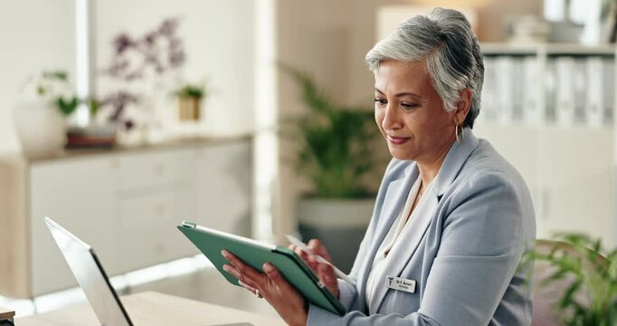 Office, research and mature woman with tablet, administration and data entry of information and smile. Online, auditor and corporate person with tech for record keeping, planning and business