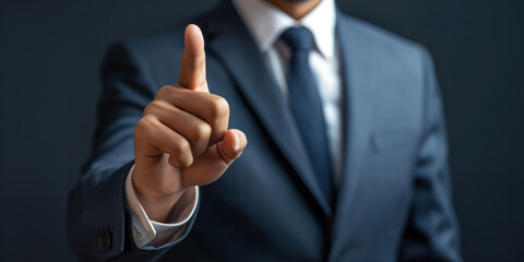 business men pointing finger blue suit black background