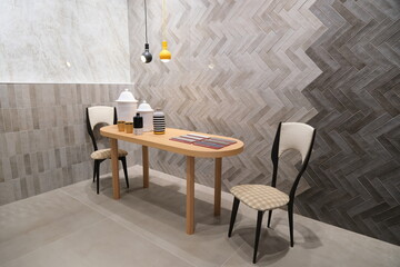 Modern Minimalist Dining Area with Stylish Decor and Herringbone Tile Wall