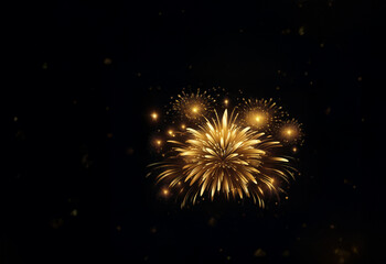 A breathtaking display of golden fireworks bursts against a dark night sky.  The radiant explosions illuminate the scene with shimmering light and celebratory splendor.