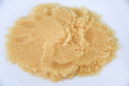 Microbeads of ion-exchange resin (ion-exchange polymer) Wet resin filtration for water purification on white background