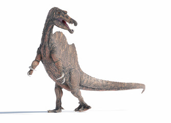 Fototapeta premium Spinosaurus walking across a barren landscape during the late Cretaceous period