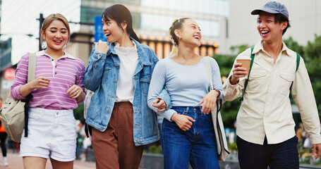 Happy, asian students and walking with laugh in city for social, community or friendship at campus....