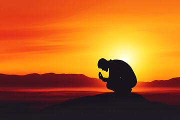 A silhouette of a person praying in a vast desert under a stunning sunset, evoking faith and solitude. Perfect for spiritual or motivational projects