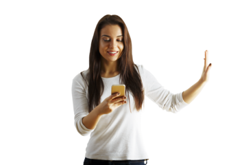 A woman in a white shirt holding a phone and smiling while gesturing with her other hand, isolated on a white background, concept of communication
