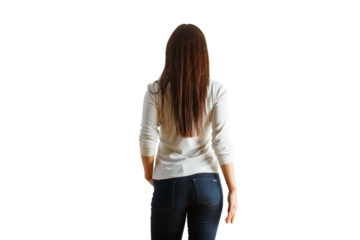 Rear view of a woman in casual jeans and a white top, long hair flowing, isolated on a clean white background. Concept of fashion and simplicity