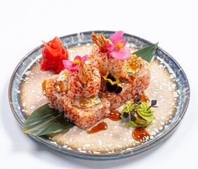 Pink Japanese Rolls Decorated with Flowers on a White Background