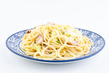 A plate of cabbage and lean meat fried noodles