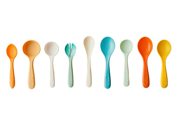 Colorful collection of plastic spoons and forks displayed in a row for food preparation and serving purposes