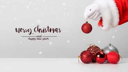 Christmas composition. Christmas balls with red on white background.
