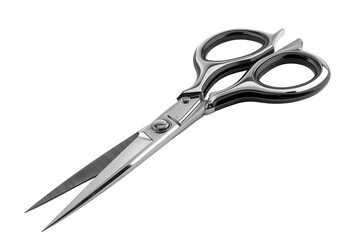 Obraz premium Sharp scissors resting on a smooth surface, reflecting light in a well-lit room