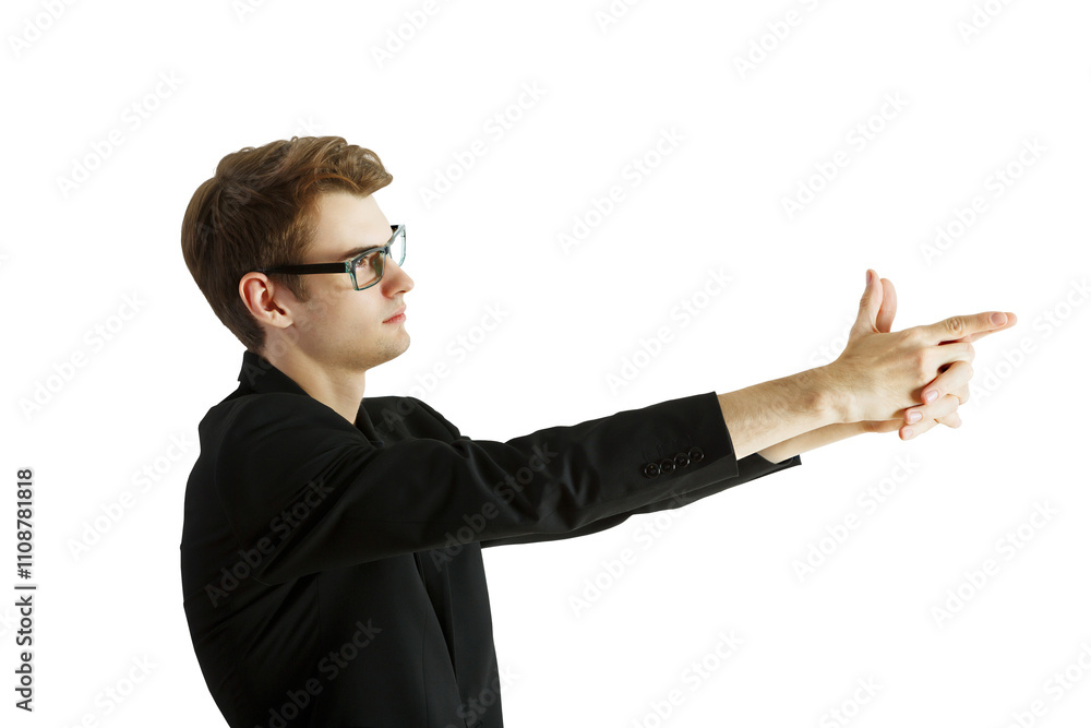 Poster Side view of a man in glasses, wearing a dark suit, making a hand gesture resembling a pointing motion. Isolated on white background, concept of communication