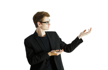 Young man in asuit and glasses, gesturing with open hands, isolated on a white background. Concept of presentation or offering